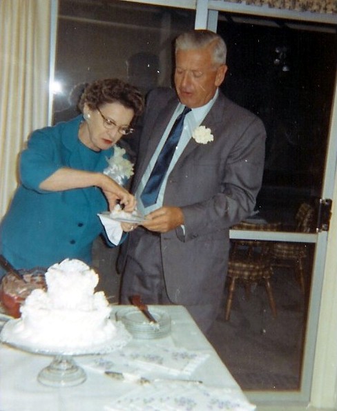 Jimmy & Goldie Hankins cutting wedding cake